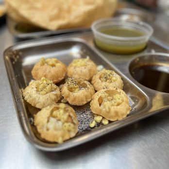 Vik's Chaat signature dishes Pani PuriDahi Batata PuriMasala Dosa